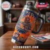 Chicago Bears 107th Anniversary YETI Stanley Tumbler featuring orange and navy blue tie-dye graphics and team logo details.