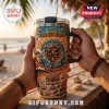 Chicago Bears 1919-2026 Stanley Tumbler 40oz with a beach theme, bear graphic, sunglasses, and waves, held against a sunset.