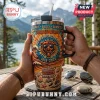 Chicago Bears 1919-2026 Stanley Tumbler 40oz featuring a tropical beach bear graphic, orange and blue hues, and a straw lid.