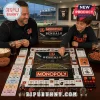 Cincinnati Bengals Monopoly Collector Board Game played by a father and son on a wooden table with game pieces and snacks.
