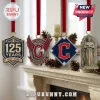 Cleveland Guardians 125th Anniversary Advent Calendar 2026 hanging ornaments featuring team logos and stone angel statue.