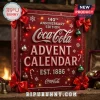 Coca-Cola 140th Anniversary 2026 Ornament Advent Calendar with red gift box, decorative snowflakes, and festive mini ornaments.