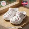 Custom Name Hello Kitty Kawaii Clogs in white featuring pink hearts and character graphics on a wooden surface.