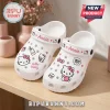 Custom Name Hello Kitty Kawaii Clogs in white featuring pink hearts, milk cartons, and character graphics on a wood table.