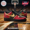Custom WNBA All Teams Black Edition Nike Air Force 1 sneakers in red, black, and gold on a hardwood basketball court.