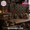 Days Of Krampus Christmas Advent Calendar featuring dark creature figurines on a wooden desk with a numbered box backdrop.