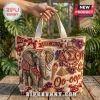 Delta Sigma Theta Beaded Elephant Tote Bag with crimson and cream embroidery, Greek letters, and floral accents.