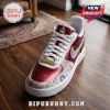 Delta Sigma Theta Crimson Low Top Air Force 1 sneakers featuring metallic red panels, white overlays, and Greek symbols.
