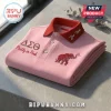 Delta Sigma Theta Custom Name Polo Shirt in pink with a red collar, featuring a rhinestone elephant and Greek letters.