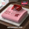 Delta Sigma Theta Custom Name Polo Shirt in light pink featuring red collar, Greek letters, and embroidered red elephant.