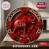 Delta Sigma Theta Elephant 2026 Christmas ornament in red and gold with 1913, rose accents, and Greek letters in a circular frame.
