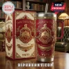 Delta Sigma Theta Embossed YETI Stanley Tumbler in crimson with gold crest, pearls, and matching display box on a desk.