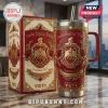 Delta Sigma Theta Embossed YETI Stanley Tumbler in crimson with gold crest, raised roses, and matching display box.