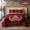 Delta Sigma Theta Maroon Quilted 3-Piece Bedding Set featuring sorority crest, gold embroidery, and two matching pillows.