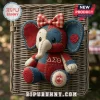 Delta Sigma Theta Patchwork Elephant Plush Toy in red and blue fabric with Greek letters, a gingham bow, and embroidered rose.