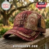 Delta Sigma Theta Red Distressed Baseball Cap with embroidered crest, 1913 patch, and fraying details on a wooden railing.