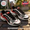 Delta Sigma Theta Sorority TN Sneakers in red, white, and black featuring sorority crests on a brick background.