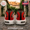 Delta Sigma Theta Sorority TN Sneakers featuring a red, black, and white colorway with Greek crests on a cobblestone path.