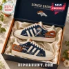 Denver Broncos NFL Casual Sneakers featuring navy, orange, and white panels with team logos in a branded presentation box.