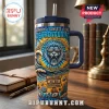 Detroit Lions 1930-2026 Stanley Tumbler 40oz with a lion graphic, ocean waves, and beach themed team motifs in blue and gold.