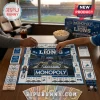 Detroit Lions Collector Monopoly Board Game set on a table with players moving silver tokens on a branded Ford Field board.