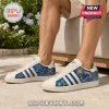 Detroit Lions Motor City Casual Sneakers featuring blue and white team graphics, a lion mascot, and football illustrations.