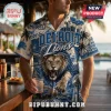 Detroit Lions NFL Mascot Hawaiian Shirt featuring a roaring lion, football graphics, and Detroit city skyline on cream.