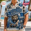 Detroit Lions NFL Mascot Hawaiian Shirt featuring a roaring lion, blue team graphics, football, and palm tree patterns.