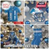 Detroit Lions Team Acrylic Christmas Ornament 2026 hanging on a tree with blue, silver, and white festive ornaments.