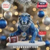 Detroit Lions Team Acrylic Christmas Ornament 2026 featuring a muscular blue lion with a football against bokeh lights.