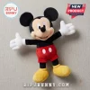 Disney Mickey Mouse soft plush toy featuring black ears, red shorts, white gloves, and yellow shoes on a grey background.