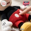 Disney Mickey Mouse Soft Plush Toy featuring black fur, red shorts with white oval buttons, and white gloved hands.