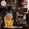 Dolly Parton I Will Always Love You shirt featuring a portrait of the singer in a yellow dress on a navy blue hoodie.