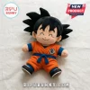 Dragon Ball Son Goku sitting plush doll wearing his signature orange martial arts gi with blue sash and black hair.