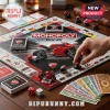 Ducati Monopoly Collector Edition Board Game featuring miniature red motorcycles, game cards, dice, and play money.