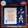 Elvis Presley Emotional Support Keychain set with a figurine, pink Cadillac charm, and inspirational quote on parchment paper.