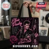 Elvis Presley The King Rock n Roll tote bag with pink rose, microphone, and quote on a black background held by hand.
