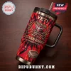 Essendon Bombers 154th Anniversary Stanley Tumbler featuring red and black flame graphics and team anniversary branding.