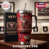 Essendon Bombers 154th Anniversary Stanley Tumbler featuring red and black flame graphics, team crest, and matching gift box.