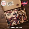 Essendon Bombers AFL Casual Hawaiian shirt in a gift box with sunglasses, seashell accents, and branded bomber ale bottle.