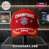 FC Bayern Munchen 2025 Champions red baseball cap with white embroidered text and golden laurel leaf detailing.