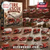 Fire Rescue 24-Day Diecast Metal Vehicle Advent Calendar box with various miniature red emergency trucks on a brick floor.