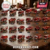 Fire Rescue 24-Day Diecast Metal Vehicle Advent Calendar featuring twenty-four miniature red emergency trucks on wood table.
