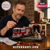 Firefighter Tribute 512-Piece Building Block Set featuring a red fire engine, a minifigure, and a dalmatian on a base.