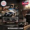 Ford GT40 Mk II Le Mans 60th Anniversary diecast car in black packaging featuring a checkered flag and race graphics.