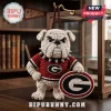 Georgia Bulldogs Crocheted Mascot Car Ornament wearing a red team jersey, spiked collar, and holding a matching logo shield.