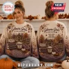 Gilmore Girls Stars Hollow Autumn Ugly Sweater featuring fall foliage, a gazebo, books, and coffee graphics on beige fabric.