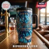 Gold Coast Titans 19th Anniversary Tie-Dye Handle Tumbler featuring blue swirl patterns, team logo, and stadium graphic.