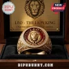 Gold Leo Zodiac Signet Ring featuring a lion head crest, red enamel inlay, and diamond pavé border in a wooden display box.