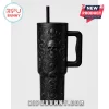 Gothic Skull Snake Black Stanley Tumbler 40oz featuring an embossed pattern of skulls, snakes, and moon phases on matte black.